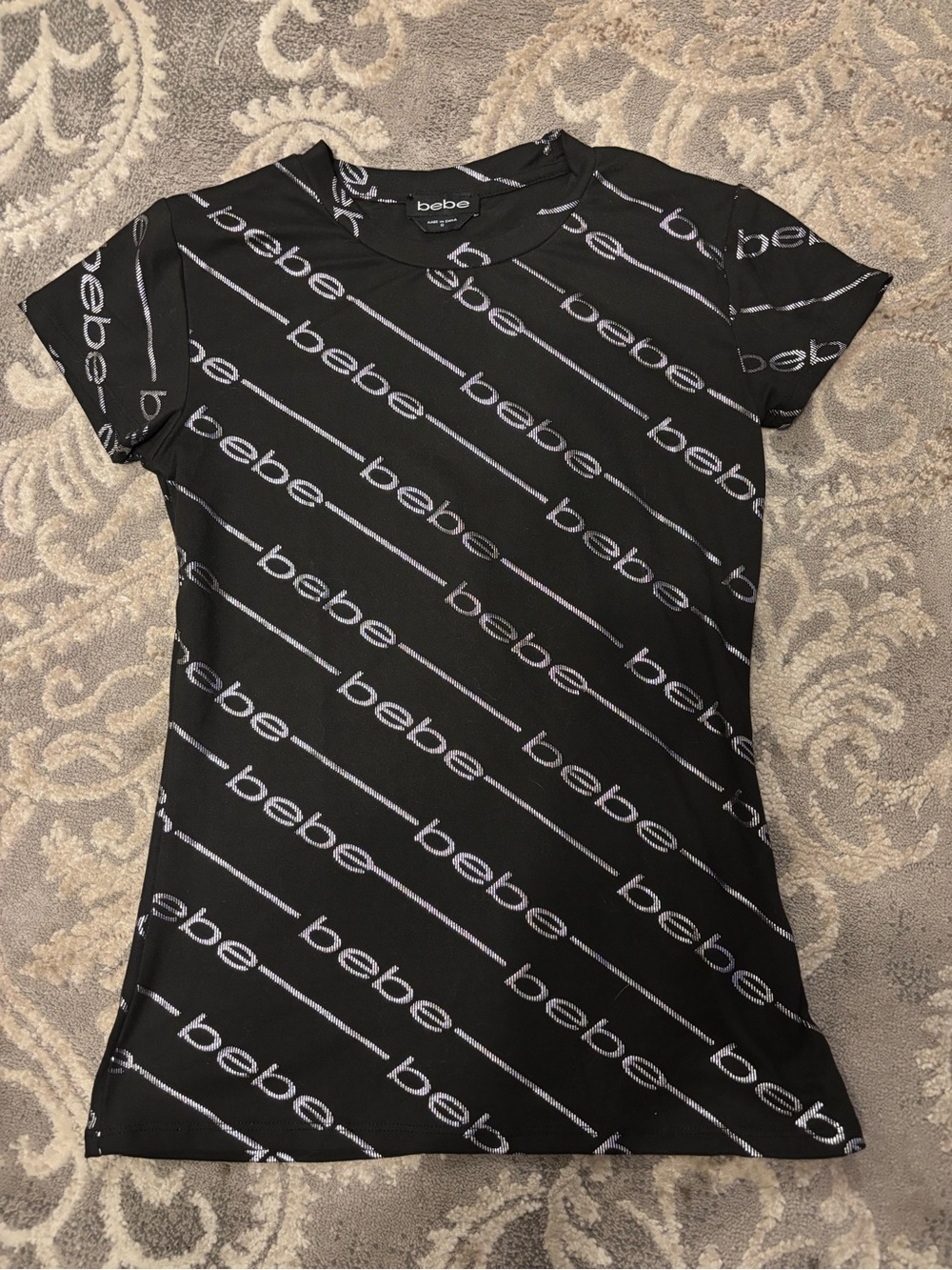 bebe Black Tee with Silver Diagonal Logo Print Size S.